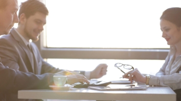 close up.business team considers profit using calculator.accounting