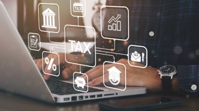 Busines using a computer to complete Individual income tax return form online for tax payment. Government, state taxes. Data analysis, paperwork, financial research, report. Calculation tax return.